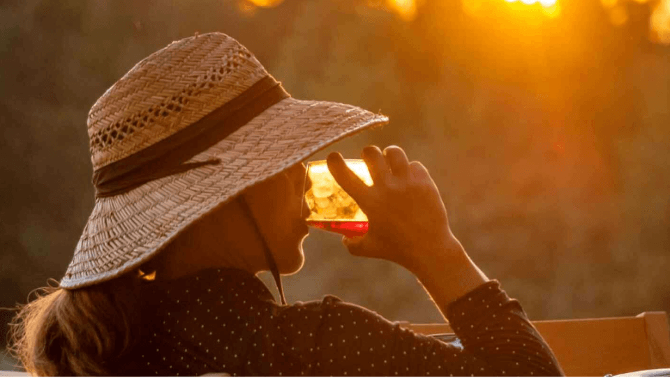 Unwind after the tournament with a handcrafted cocktail and mountain sunset, capturing the essence of Asheville's vibrant food, beverage, and outdoor lifestyle beyond the fairways. Unwind after the tournament with a handcrafted cocktail and mountain sunset, capturing the essence of Asheville's vibrant food, beverage, and outdoor lifestyle beyond the fairways.