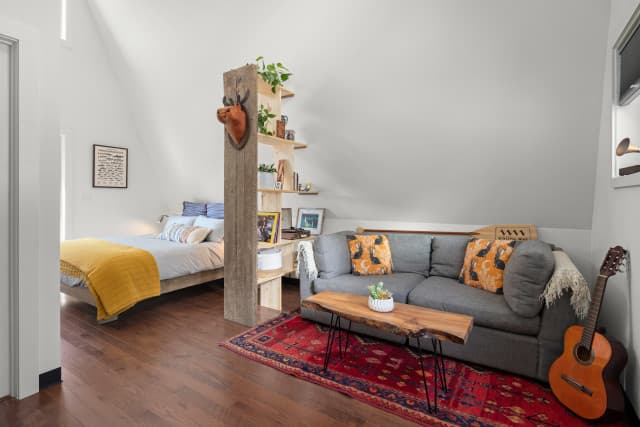 Open floor plan interior of an A-frame cabin Open floor plan interior of an A-frame cabin