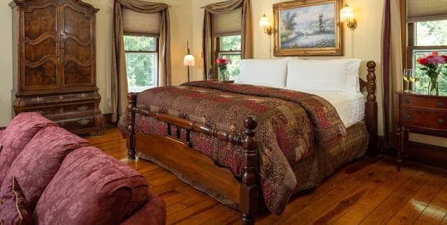 Captain’s Guestroom with antique furnishings in Engadine’s historic inn. Captain’s Guestroom with antique furnishings in Engadine’s historic inn.