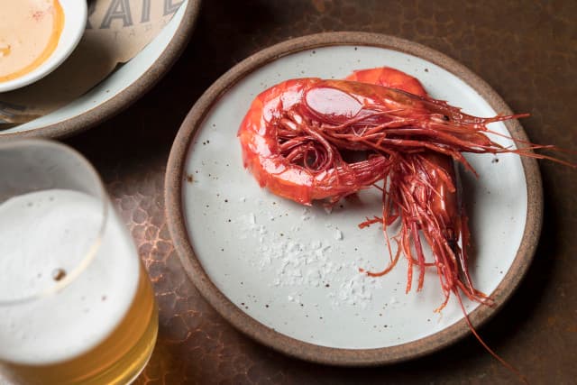 The famous large head-on mediterranean prawn, served “peel and eat style” The famous large head-on mediterranean prawn, served “peel and eat style”