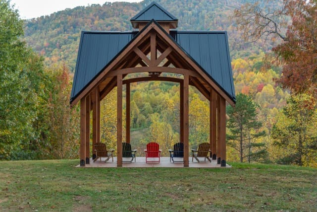 Engadine’s timber ceremony pavilion in its private mountain setting. Engadine’s timber ceremony pavilion in its private mountain setting.