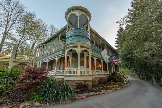 The historic Victorian inn and its distinctive wraparound porches at Engadine. The historic Victorian inn and its distinctive wraparound porches at Engadine.