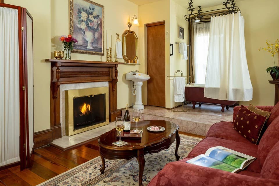 Fireplace and sitting area in Captain’s Guestroom at Engadine Inn. Fireplace and sitting area in Captain’s Guestroom at Engadine Inn.