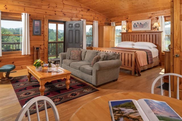 Guest bedroom and wood interior inside Cherokee Cabin at Engadine. Guest bedroom and wood interior inside Cherokee Cabin at Engadine.
